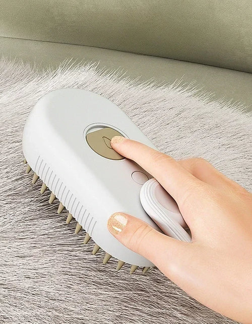 Load image into Gallery viewer, Pet Steam Brush Cat Dog Cleaning Steamy Spray Massage Beauty Comb 3 in 1 Hair Removal Grooming Supplies Pets Accessories Comb
